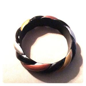 Gold, silver, copper, & black colored bangle